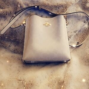 Mollie Bucket Bag 22 In Signature Canvas